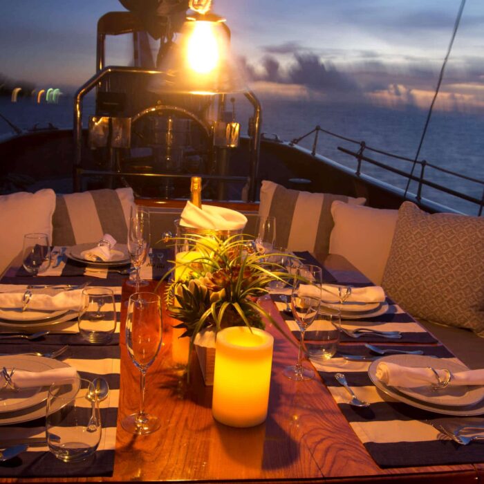 EROS luxury superyacht charter cockpit dining at night