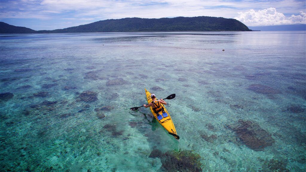 An arial shot of a person kayaking in Indonesia