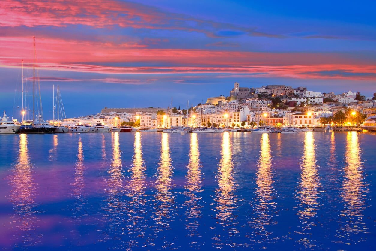 Mediterranean supoeryachtcharter night view of Ibiza Island with water and