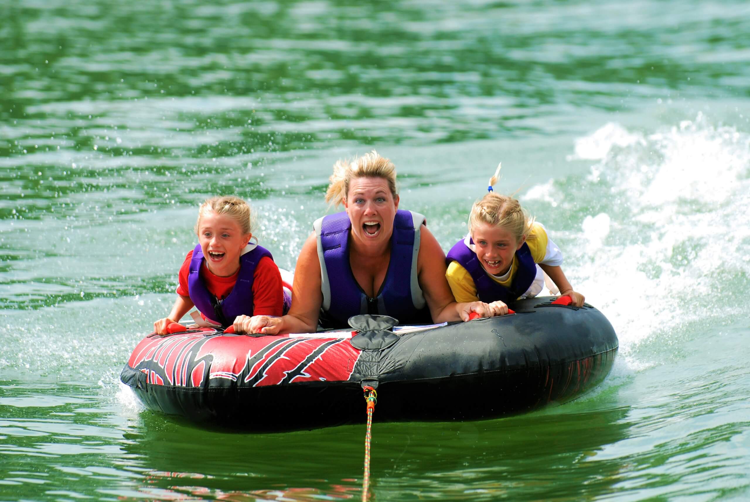Twins with Mom Riding Tube superyacht charter