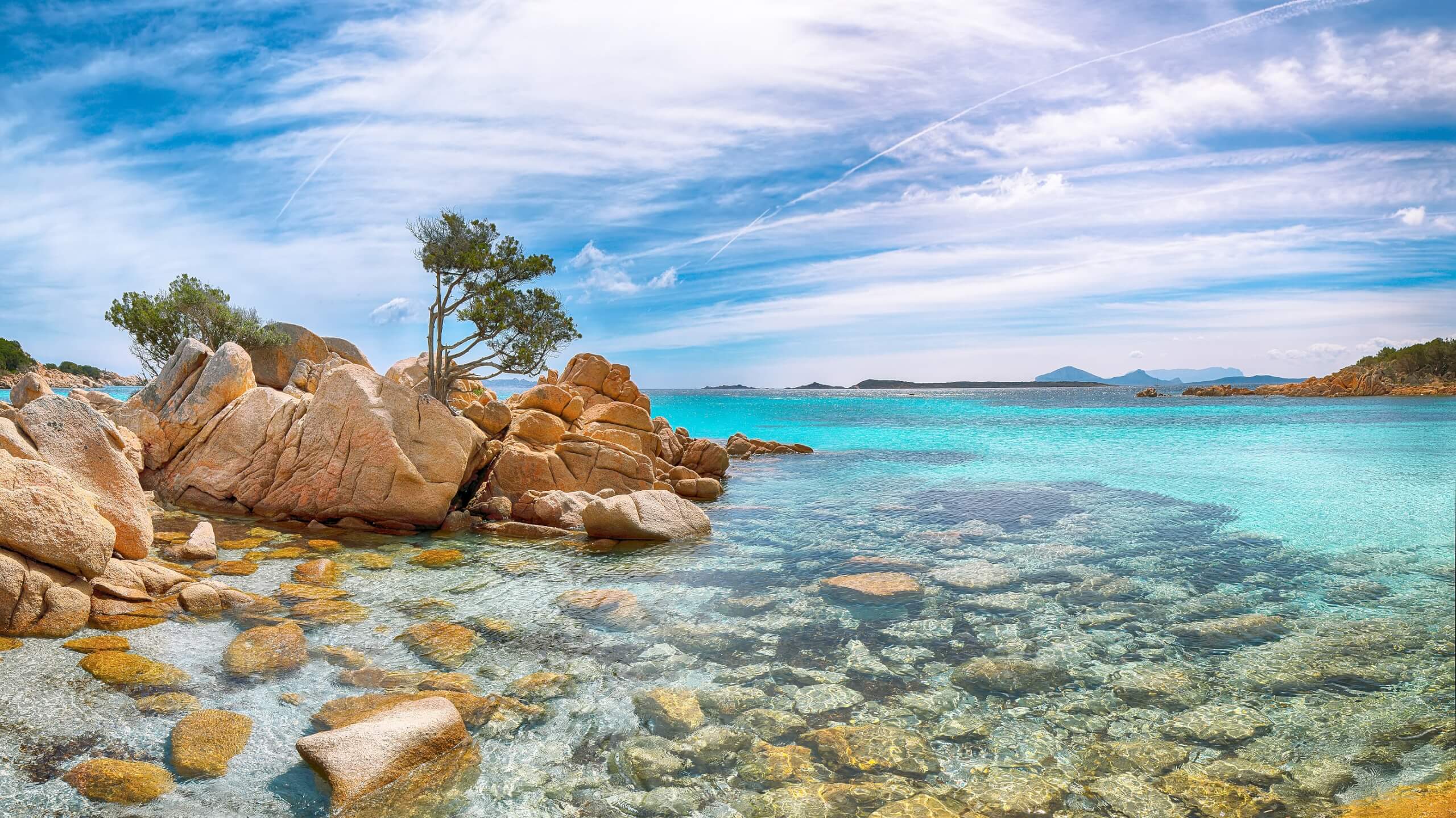 superyacht charter in italy, Enchanting view of Capriccioli beach in Costa Smeralda.