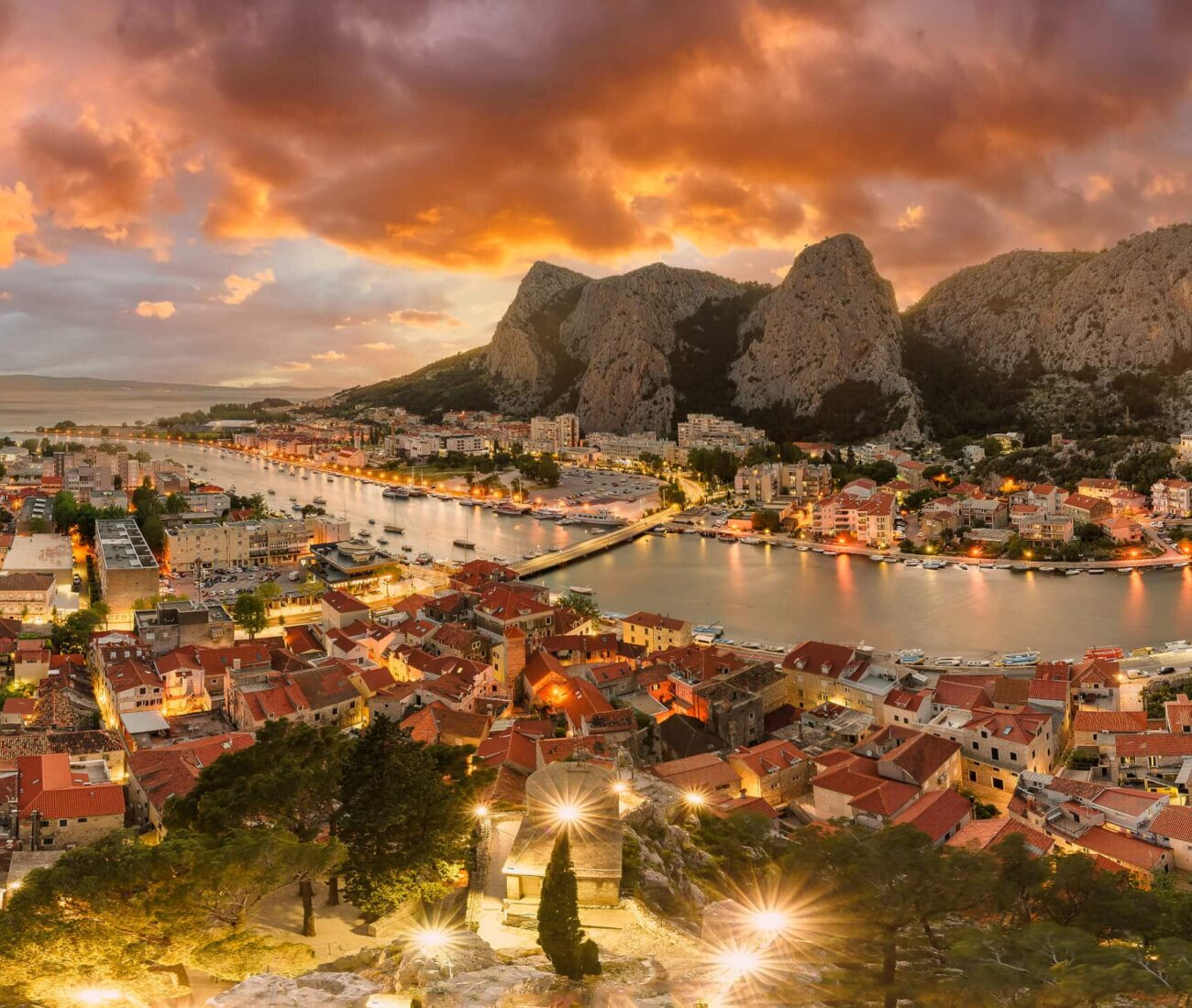 Save Download Preview Landscape with Omis town and Cetina river, Croatia