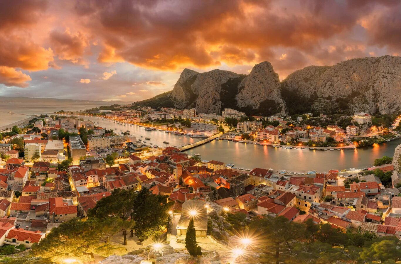 Save Download Preview Landscape with Omis town and Cetina river, Croatia