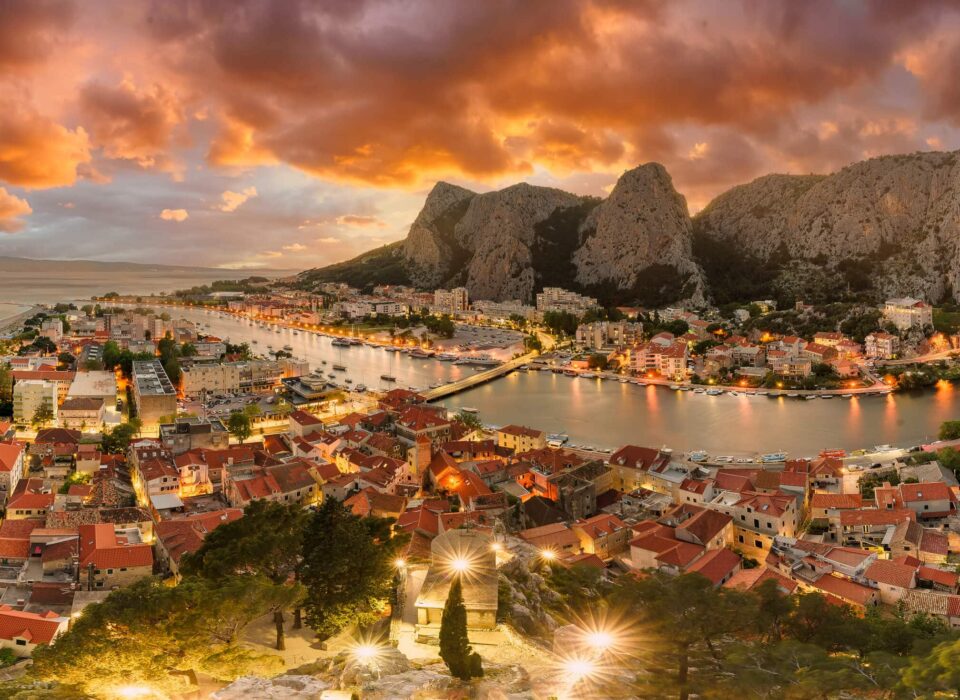 Save Download Preview Landscape with Omis town and Cetina river, Croatia