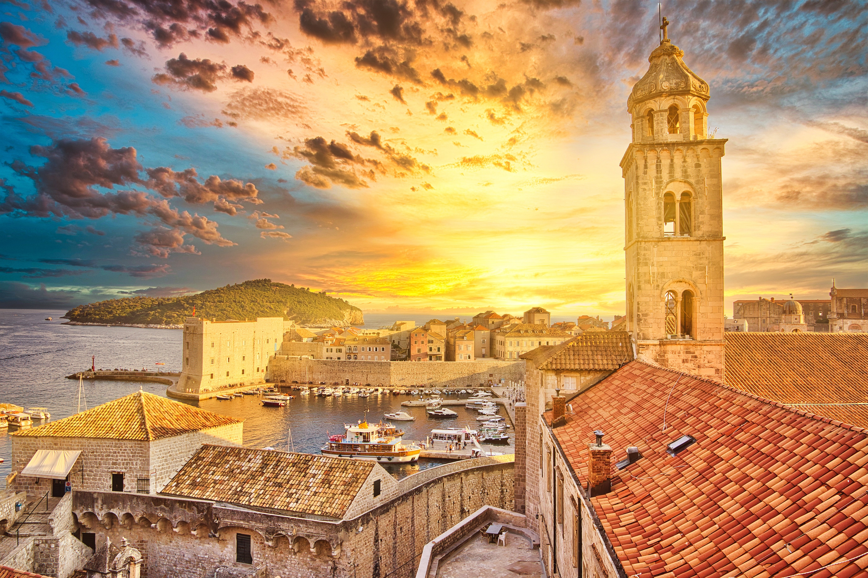 Save Download Preview sunset on top of the Dubrovnik walls in Croatia of Dalmatia