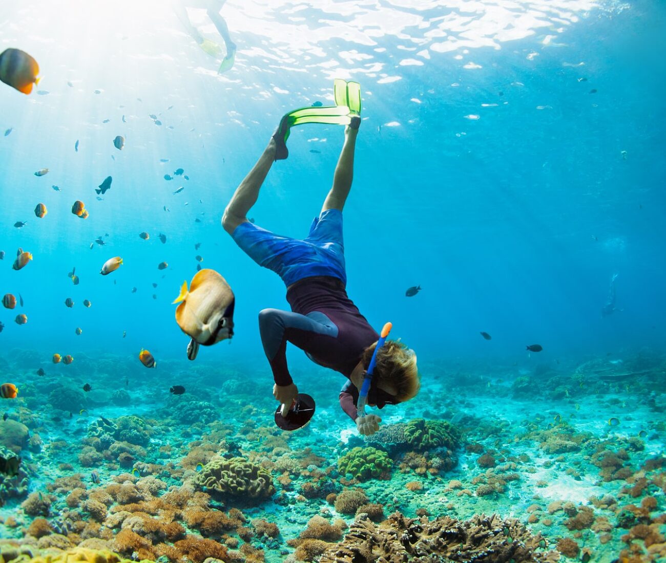 Man In Snorkeling Mask With Camera
